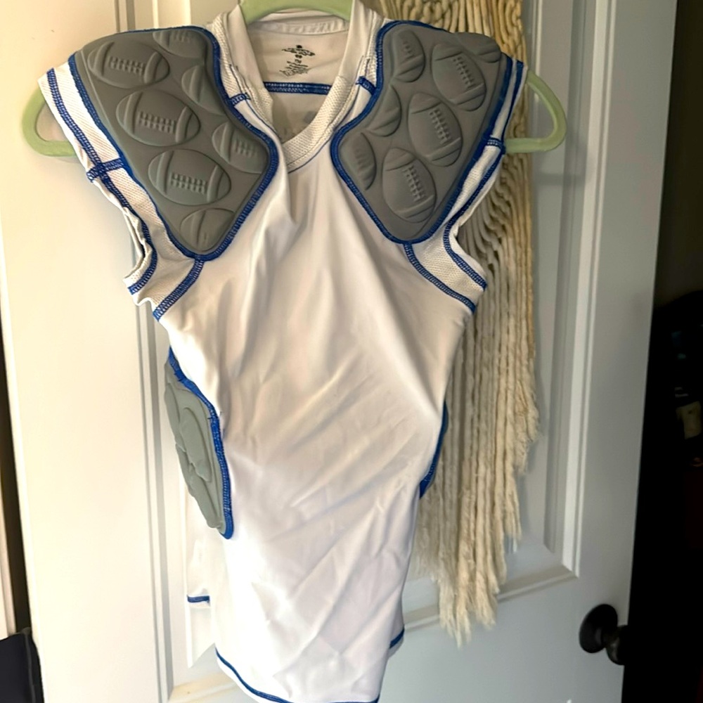 Football padded shirt.